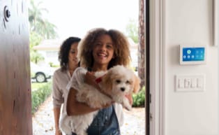 Girl holding her dog