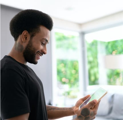 Image of man using his mobile device