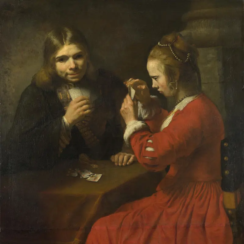 A Young Man and a Girl playing Cards