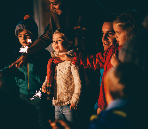 kids holding sparkler